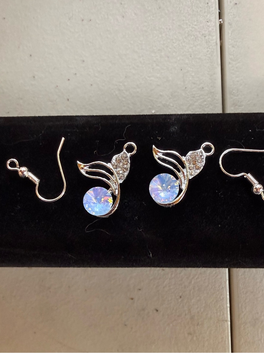 Silver Crystal Drop Earrings with Iridescent Blue Stones